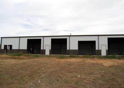 Large Metal Equipment Storage Building Tan/Brown Front View