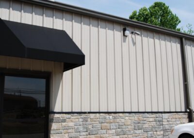 Metal Commercial Building Wainscot With Rock