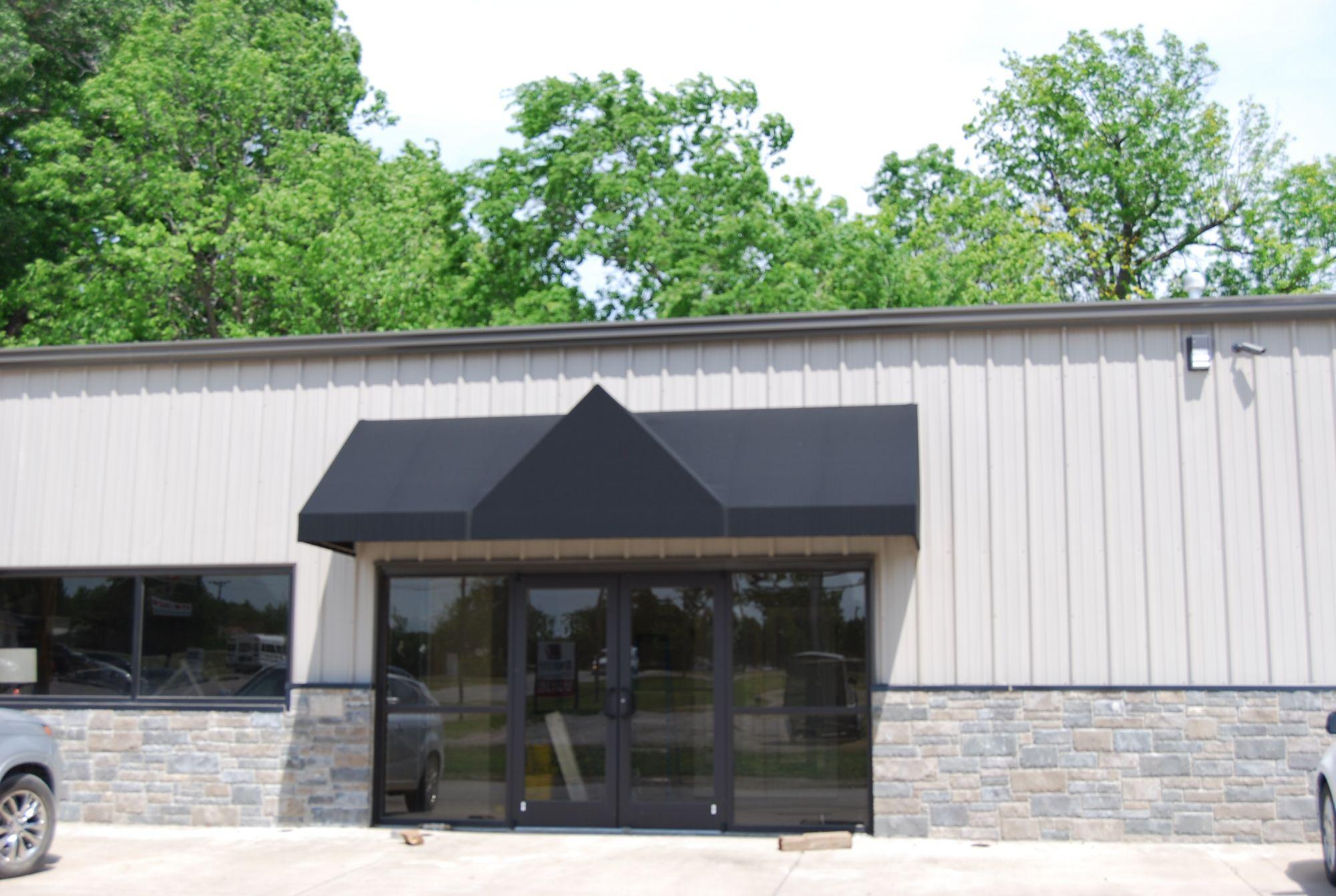 Commercial Steel Buildings Wainscot With Rock Entrance