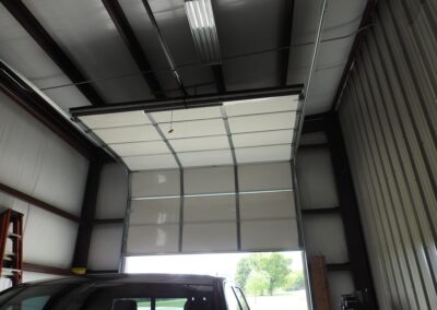 Metal Recreational Storage Building Interior With RV Door Open