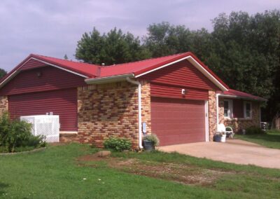 Metal Roof And Siding On Home Red