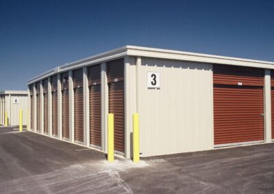 Metal Self Storage Building Facility Stone-Red Corner