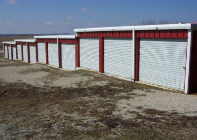 Metal Self Storage Building on Slope White-Red