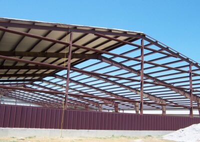 Red Iron Structural Steel Framing Arena Exterior View With Wainscot