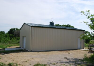 Small Metal Garage With Coupula Side