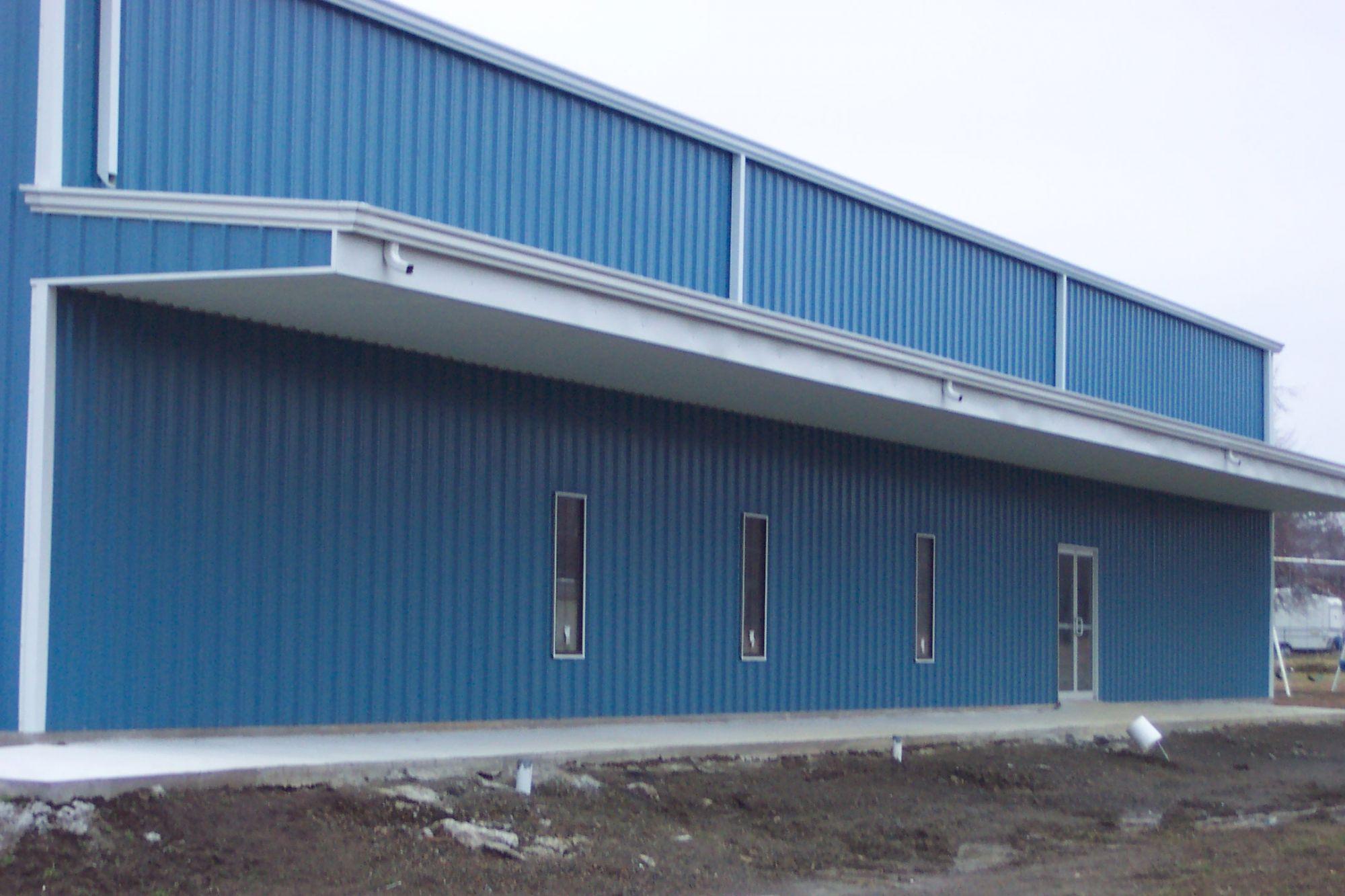 Two Story Metal Commercial Building Blue-White Side View