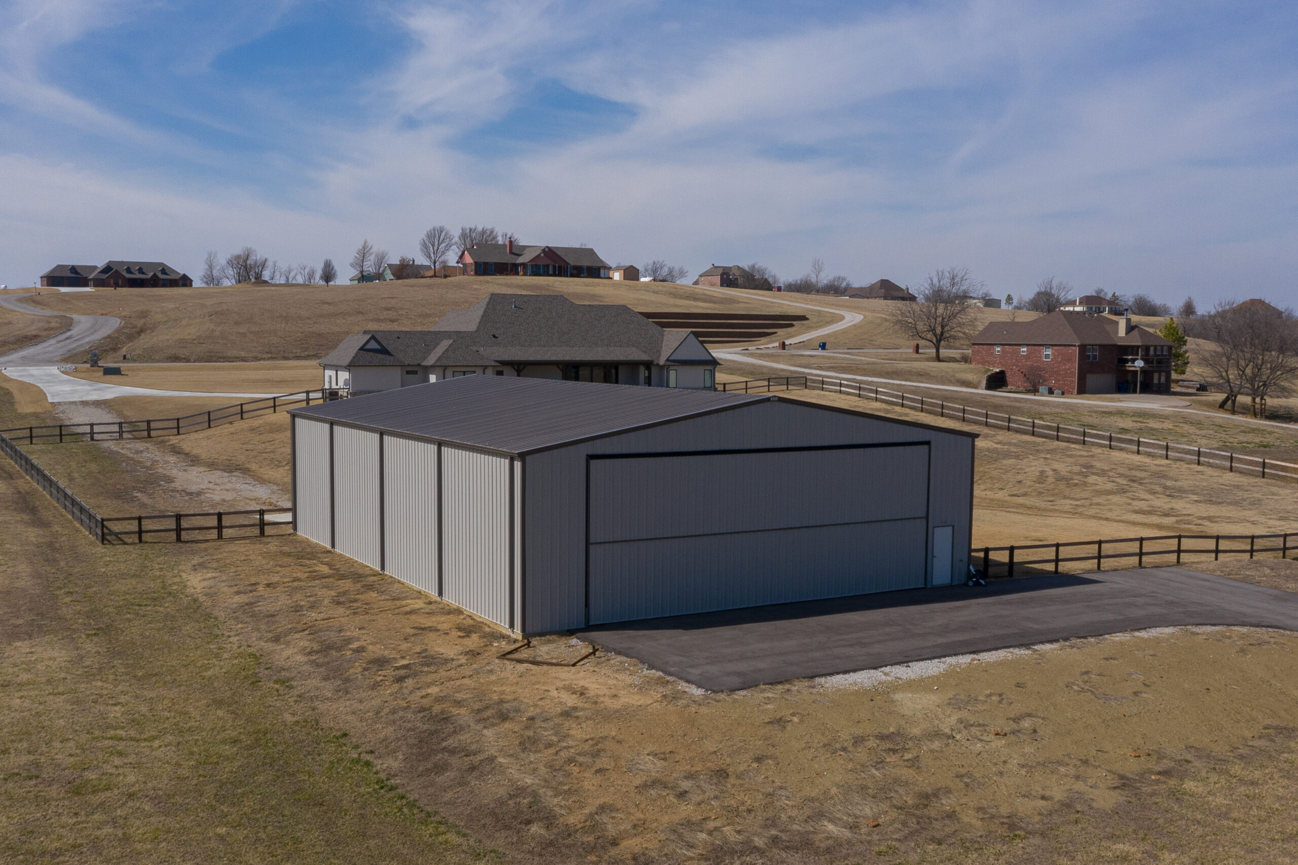 metal airplane hangar buildings aerial